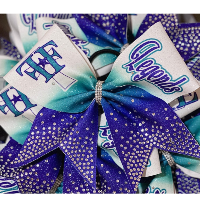 Legends custom rhinestone cheer bow in blue and white glitter design by MKY Apparels